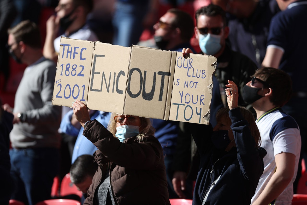 Fans protest against the Super League at the Carabao Cup Final between Manchester City and Tottenham Hotspur at Wembley Stadium, London, in April
