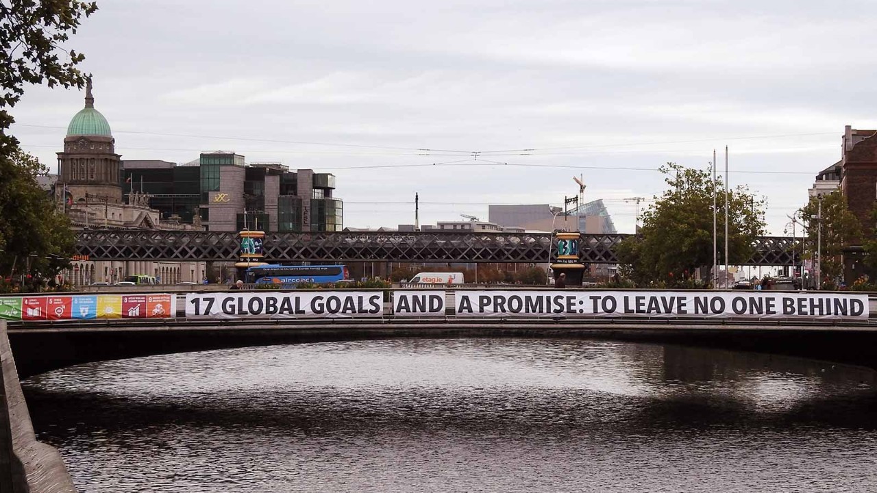 United Nations Sustainable Development 17 Global Goals banner displayed across Dublin's Rosie Hackett Bridge