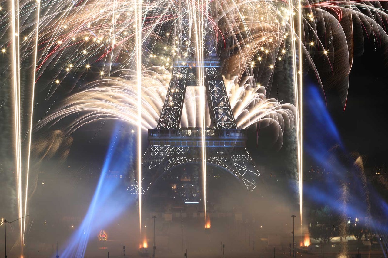 Fireworks above the Eiffel Tower as part of Bastille Day celebrations in Paris